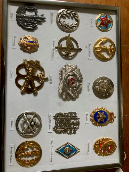 Framed Collection of World Military Badges