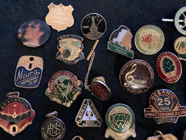 40 - Assorted Badges and Fobs