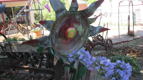 Large Garden Art Sunflower Made From Recycled Items.