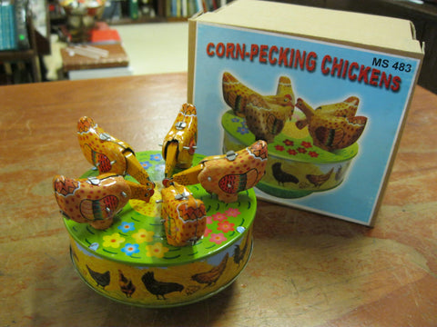 Clockwork Pecking Chickens .