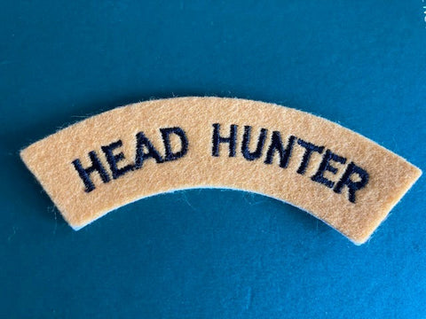 Head Hunter Shoulder Title